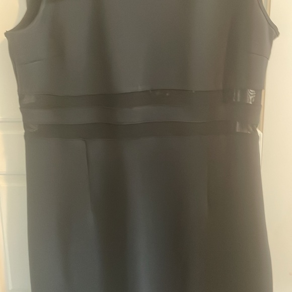 New without tags. Black mesh cut out dress by Spense. Size 12. - Picture 3 of 10